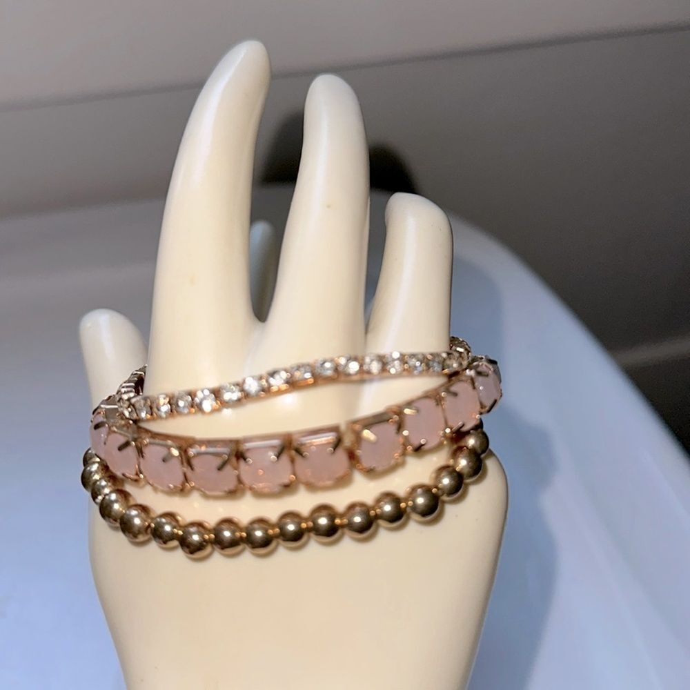 Three separate gold tone‎ stretch bracelets - Gold bead, pink stone & rhinestone